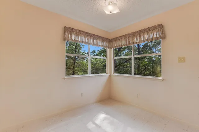 en empty room with windows