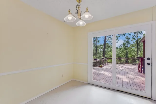 a view of a bedroom with natural light