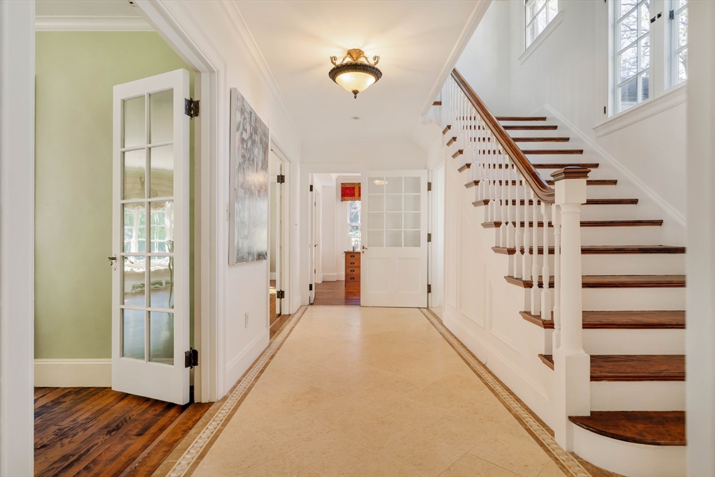 10 Rangeley Road Winchester, MA 01890 - Photo 6 of 42 a view of a hallway with wooden floor and entryway
