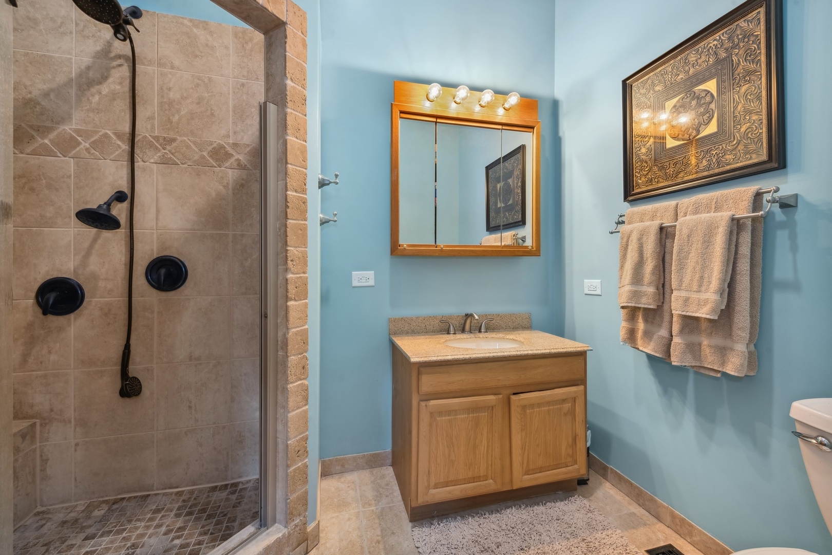 38361 North Primrose Path Spring Grove, IL 60081 - Photo 14 of 30 a bathroom with a sink and mirror