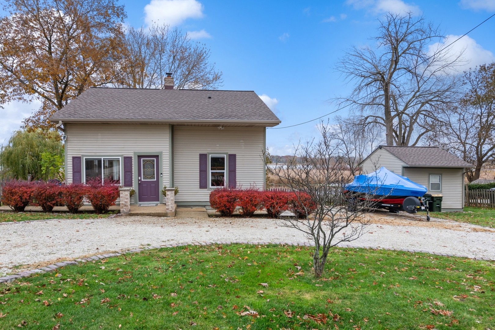 38361 North Primrose Path Spring Grove, IL 60081 - Photo 5 of 30 a front view of a house with a yard and outdoor seating