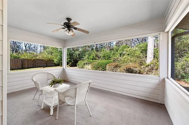 a view of a backyard with pathway