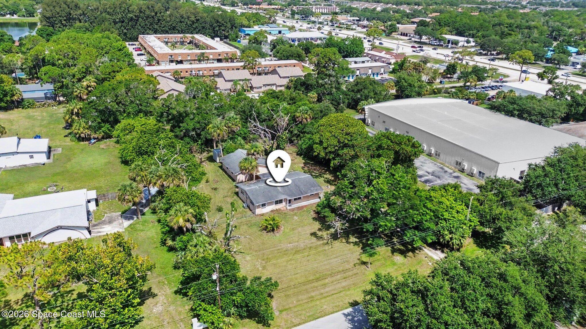 1406 Northeast Tropicana Road Palm Bay, FL 32905 - Photo 27 of 37 032_file_3372