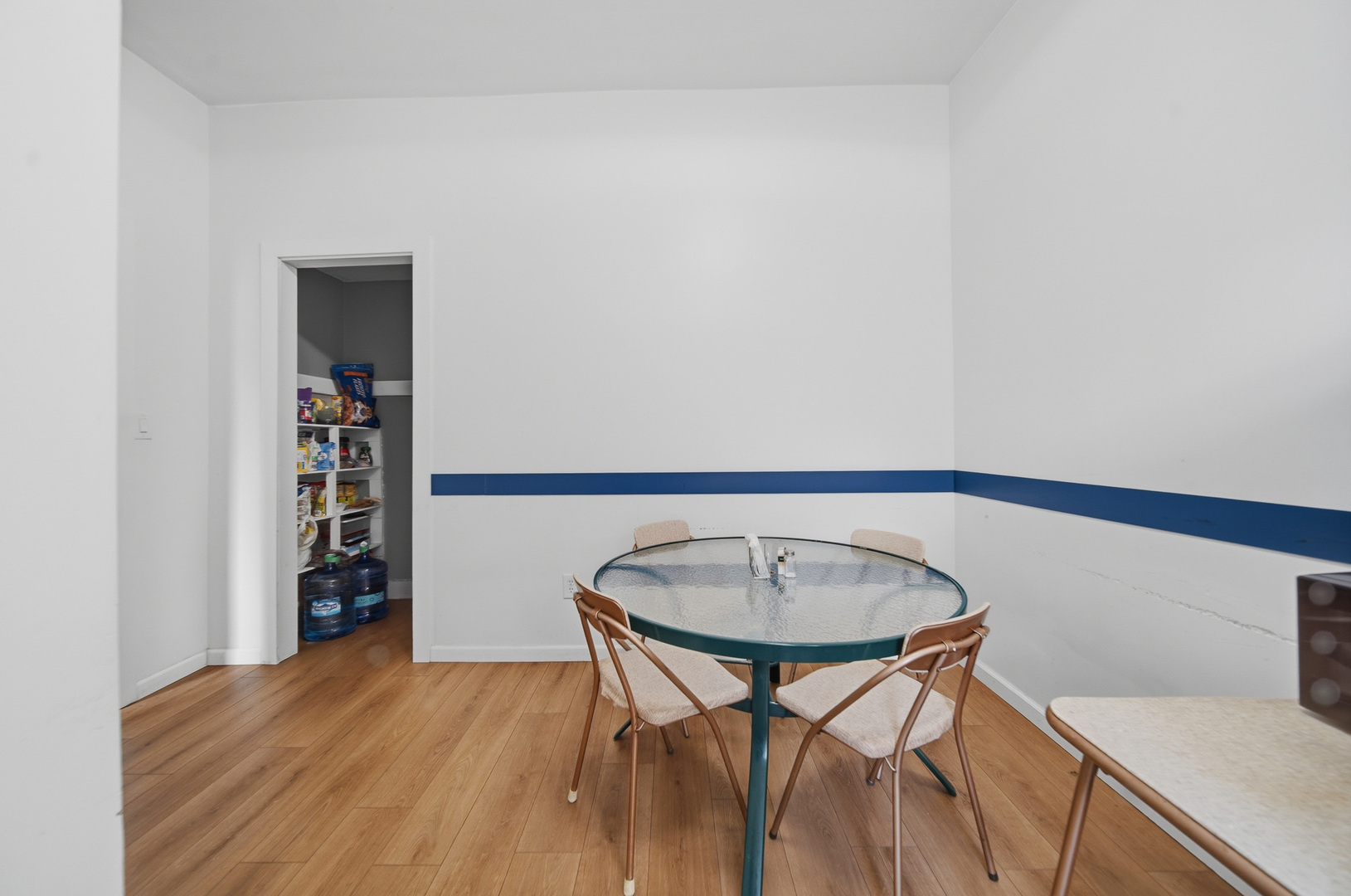 305 Monroe Avenue Dixon, IL 61021 - Photo 22 of 36 a room with a table and chairs