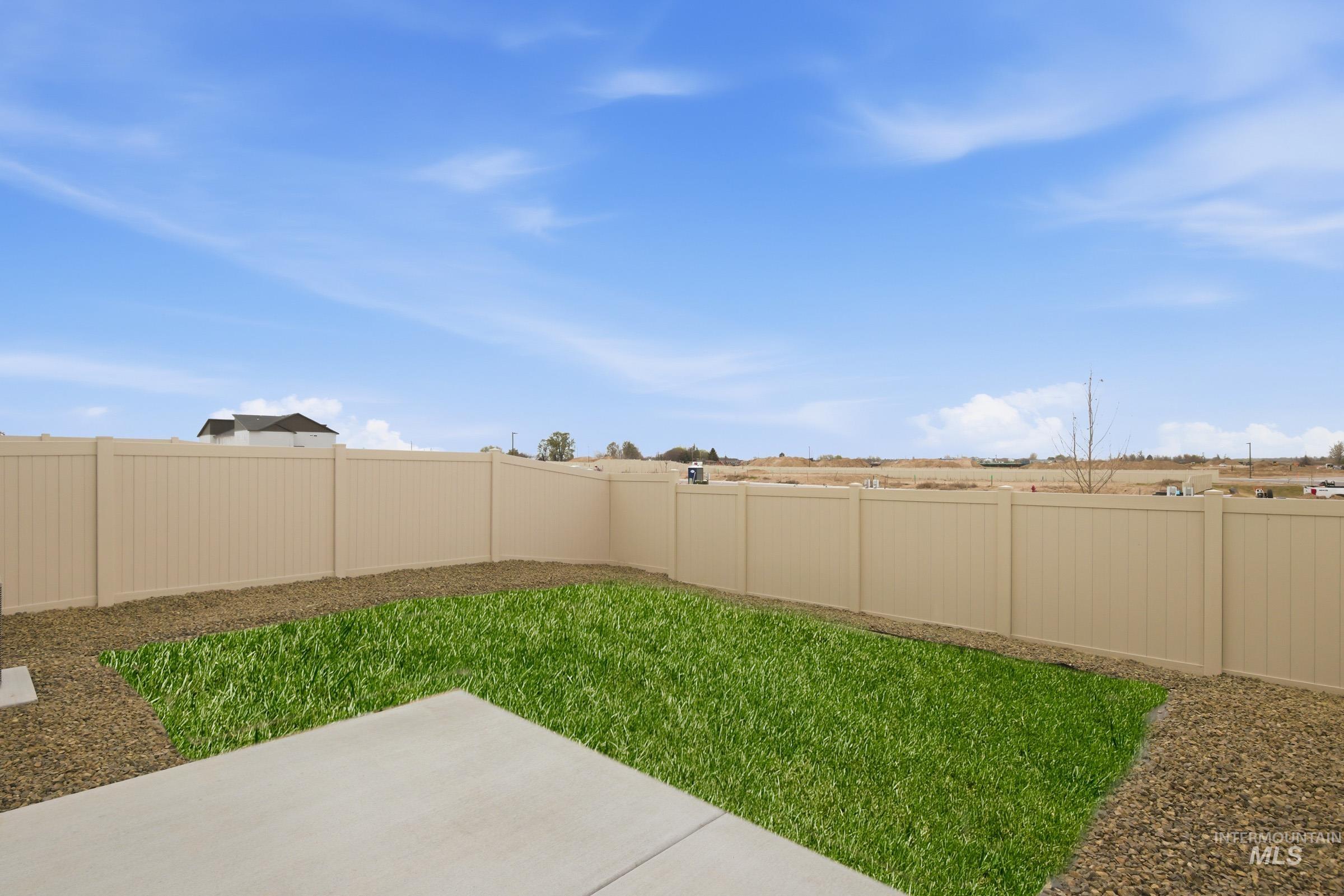 10788 Rutland Street Caldwell, ID 83605 - Photo 20 of 22 Fenced backyard with a patio