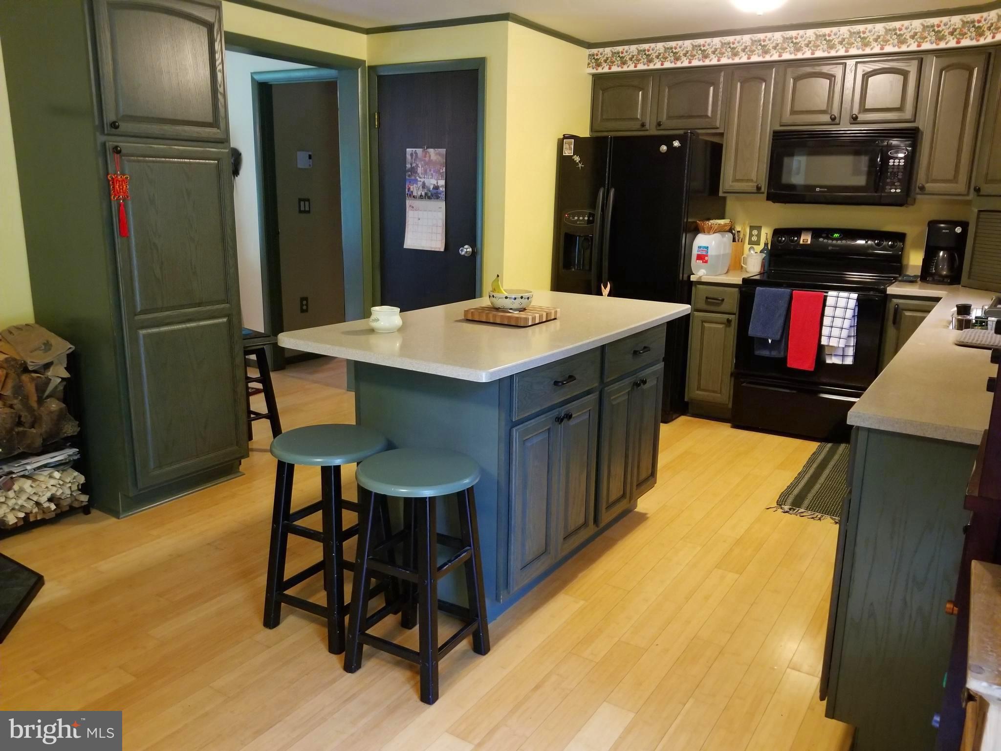 Kitchen island with stools