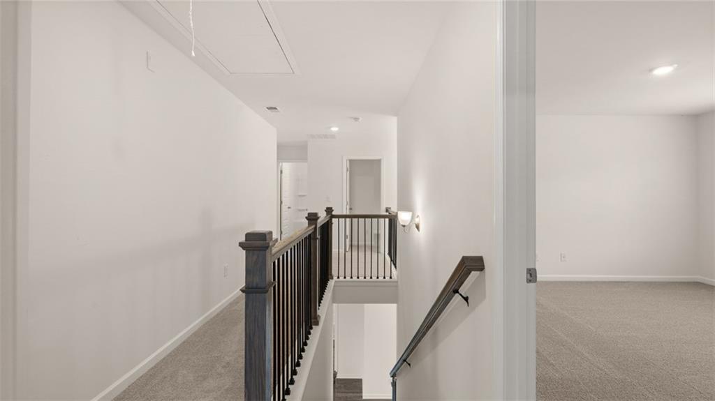 421 Hazel Drive Locust Grove, GA 30248 - Photo 25 of 28 a view of a hallway with seating area