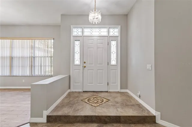 a view of entryway with a front door