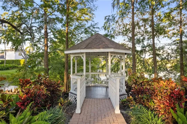 a view of a garden with a fountain
