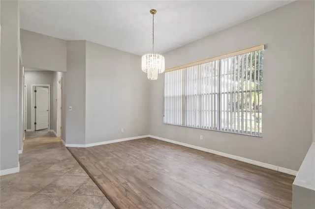 a view of livingroom with window and hardwood floor