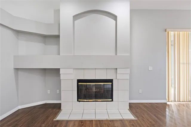 a living room with a fireplace