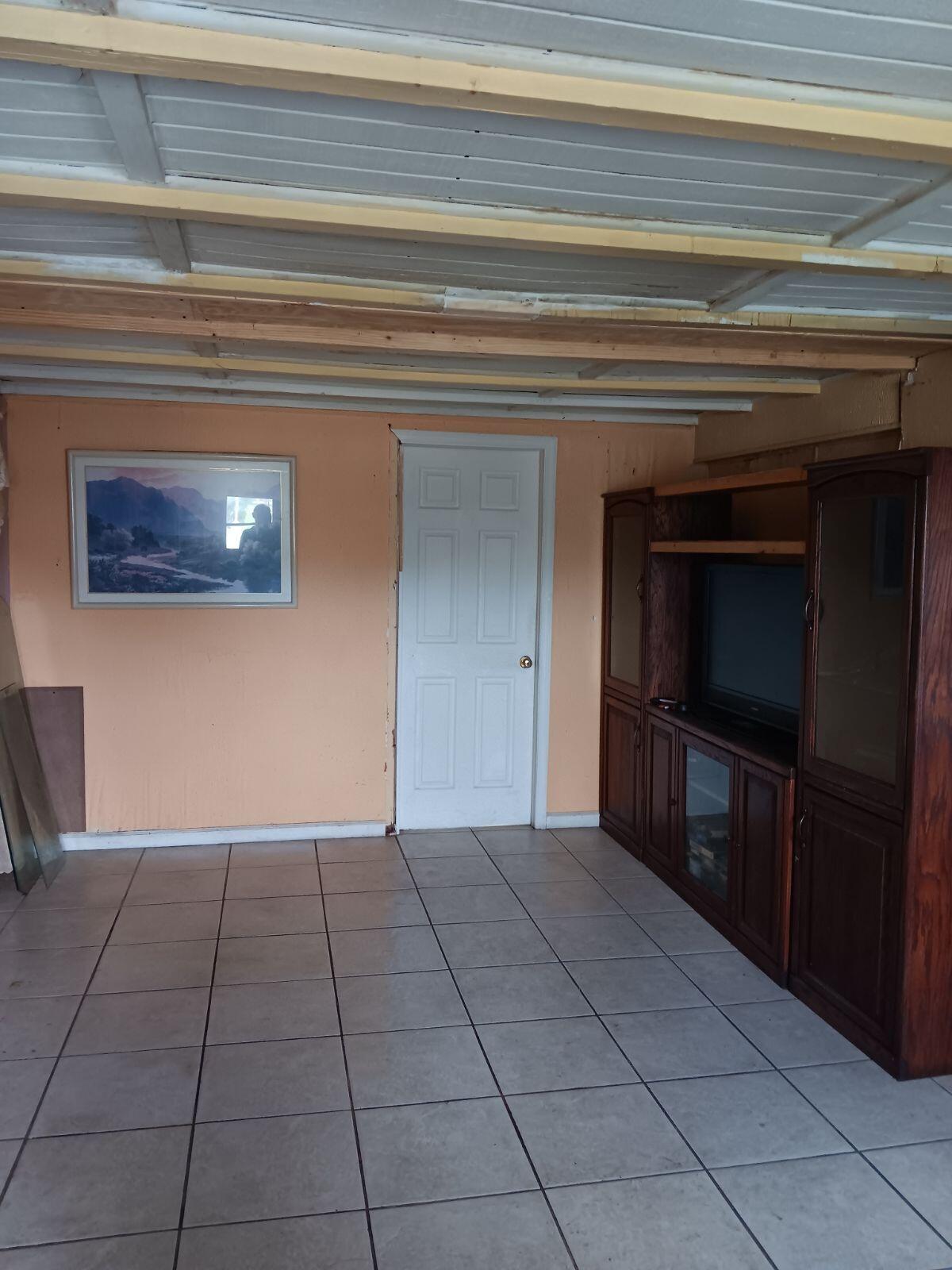 14683 Barwick Road Delray Beach, FL 33445 - Photo 5 of 6 a view of an empty room and fire place