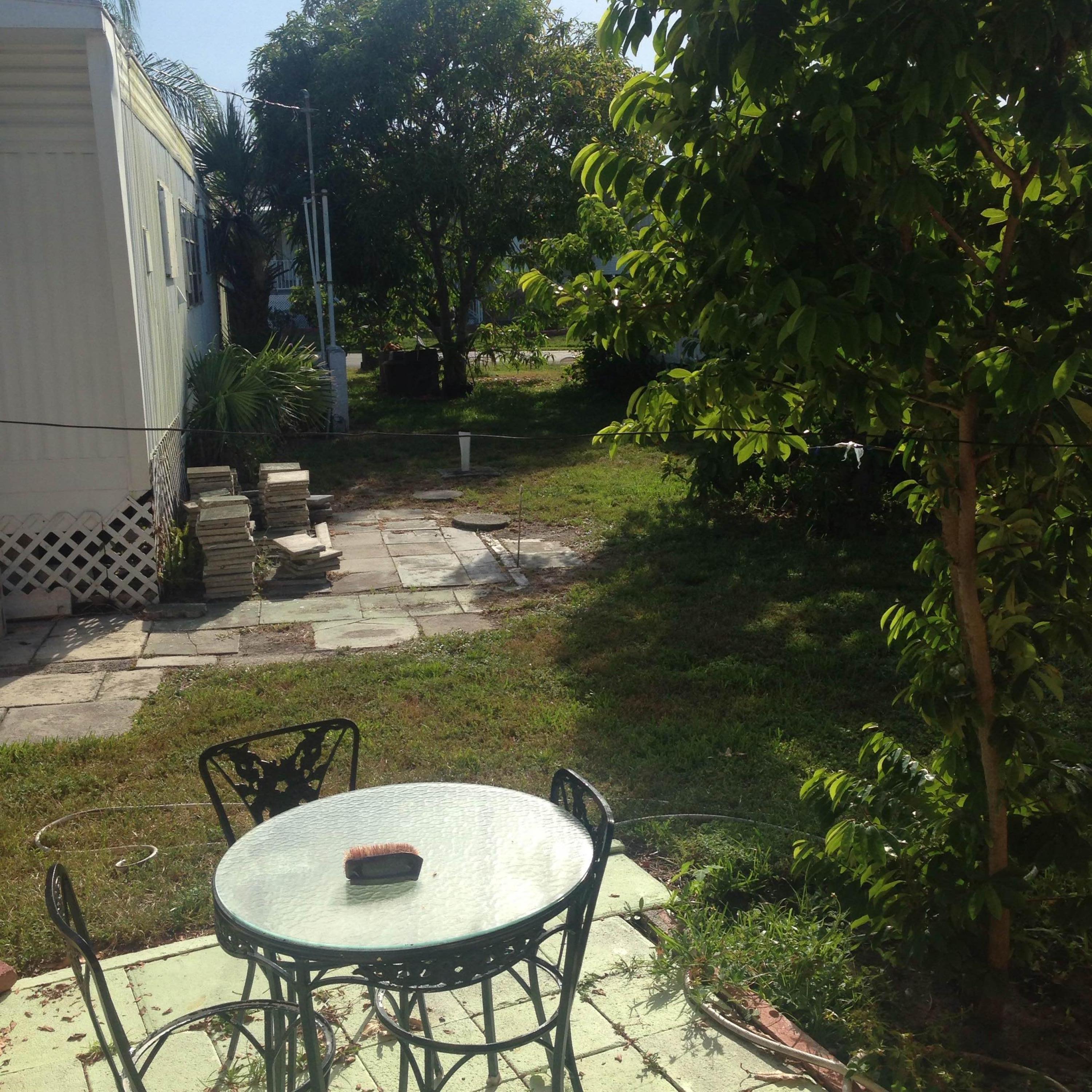 14683 Barwick Road Delray Beach, FL 33445 - Photo 6 of 6 a bathroom with a sink and mirror