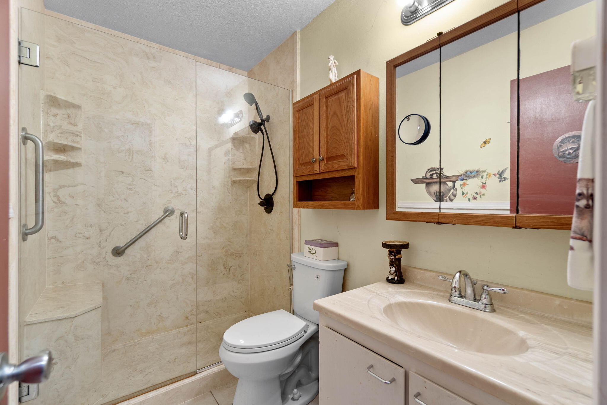 413 Ed Street Fort Walton Beach, FL 32547 - Photo 15 of 36 a bathroom with a sink toilet and shower