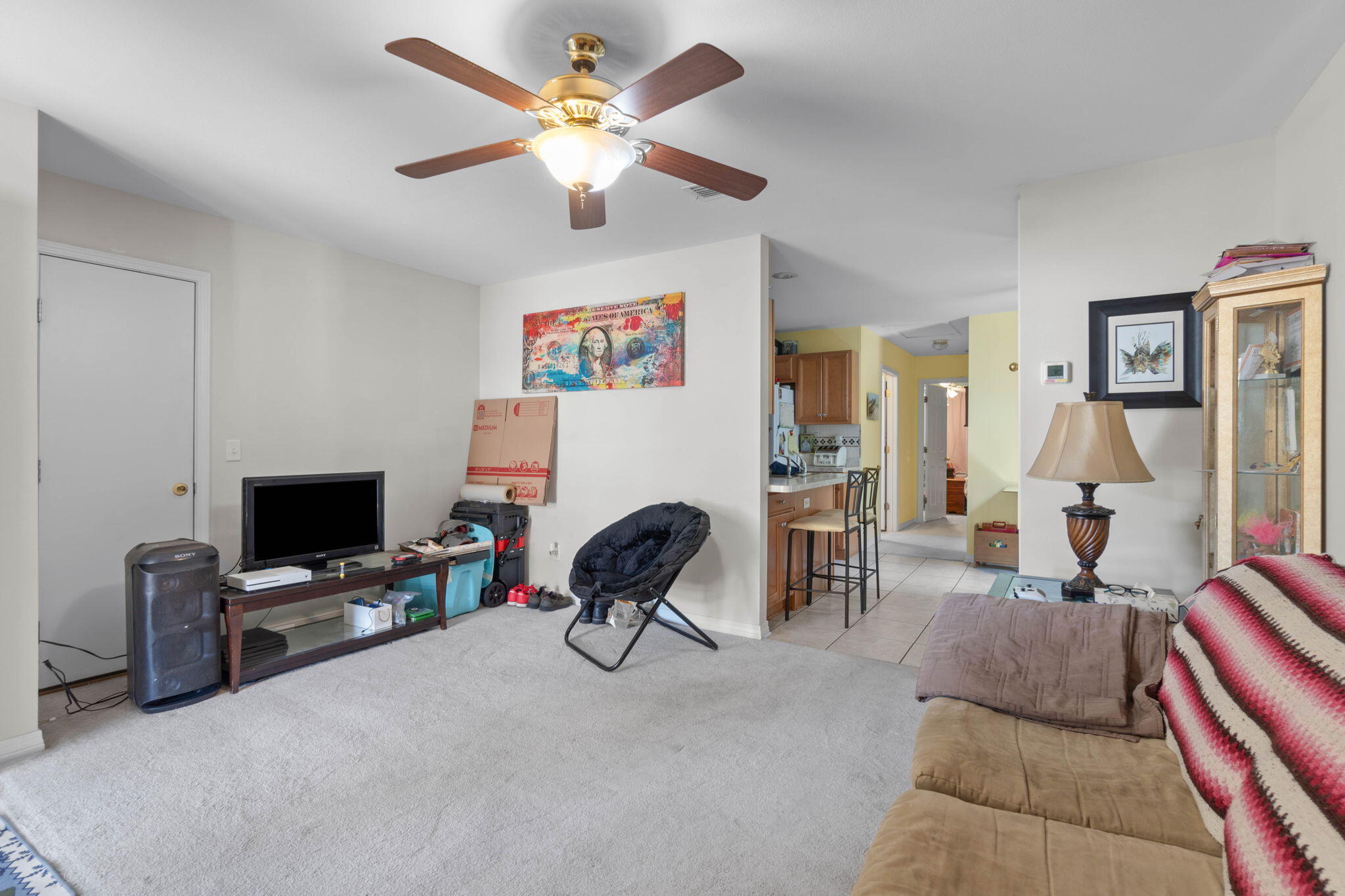 413 Ed Street Fort Walton Beach, FL 32547 - Photo 16 of 36 a living room with furniture and a flat screen tv