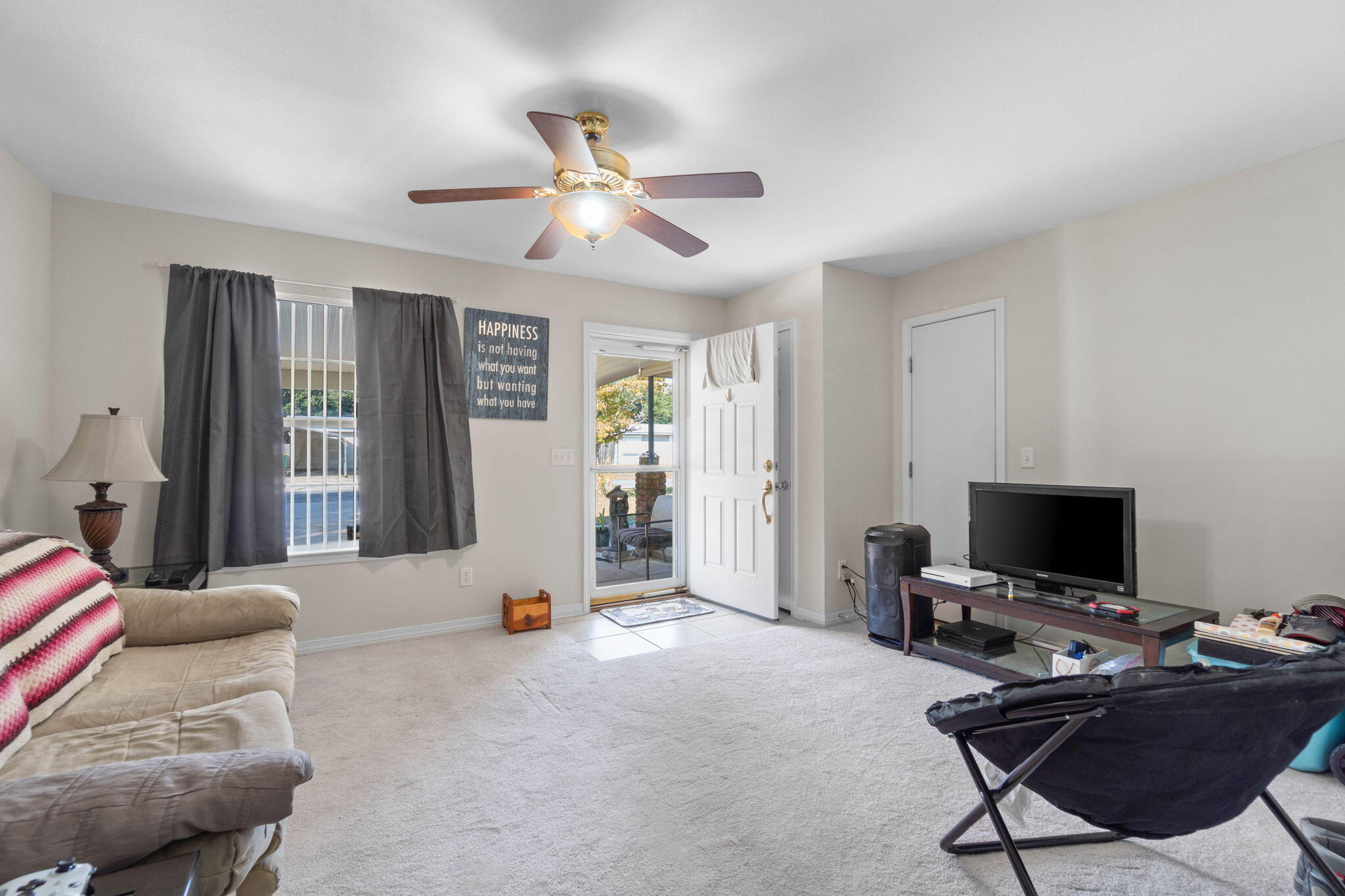 413 Ed Street Fort Walton Beach, FL 32547 - Photo 17 of 36 a view of a livingroom with workspace and a window