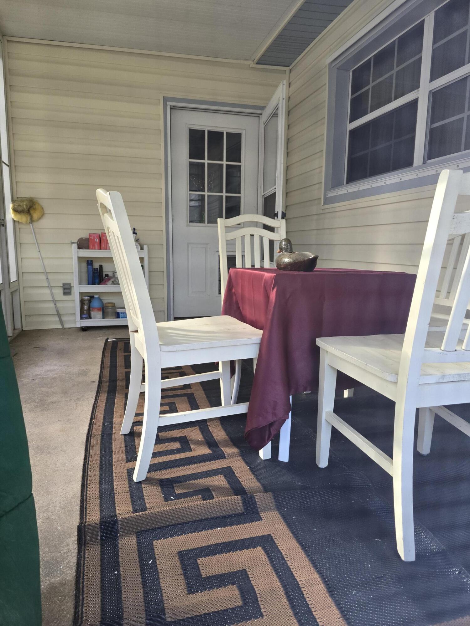 413 Ed Street Fort Walton Beach, FL 32547 - Photo 30 of 36 a view of a patio with table and chairs