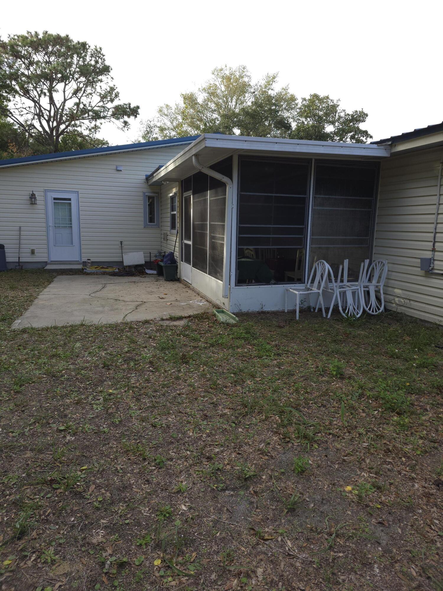 413 Ed Street Fort Walton Beach, FL 32547 - Photo 31 of 36 a house with yard in front of it