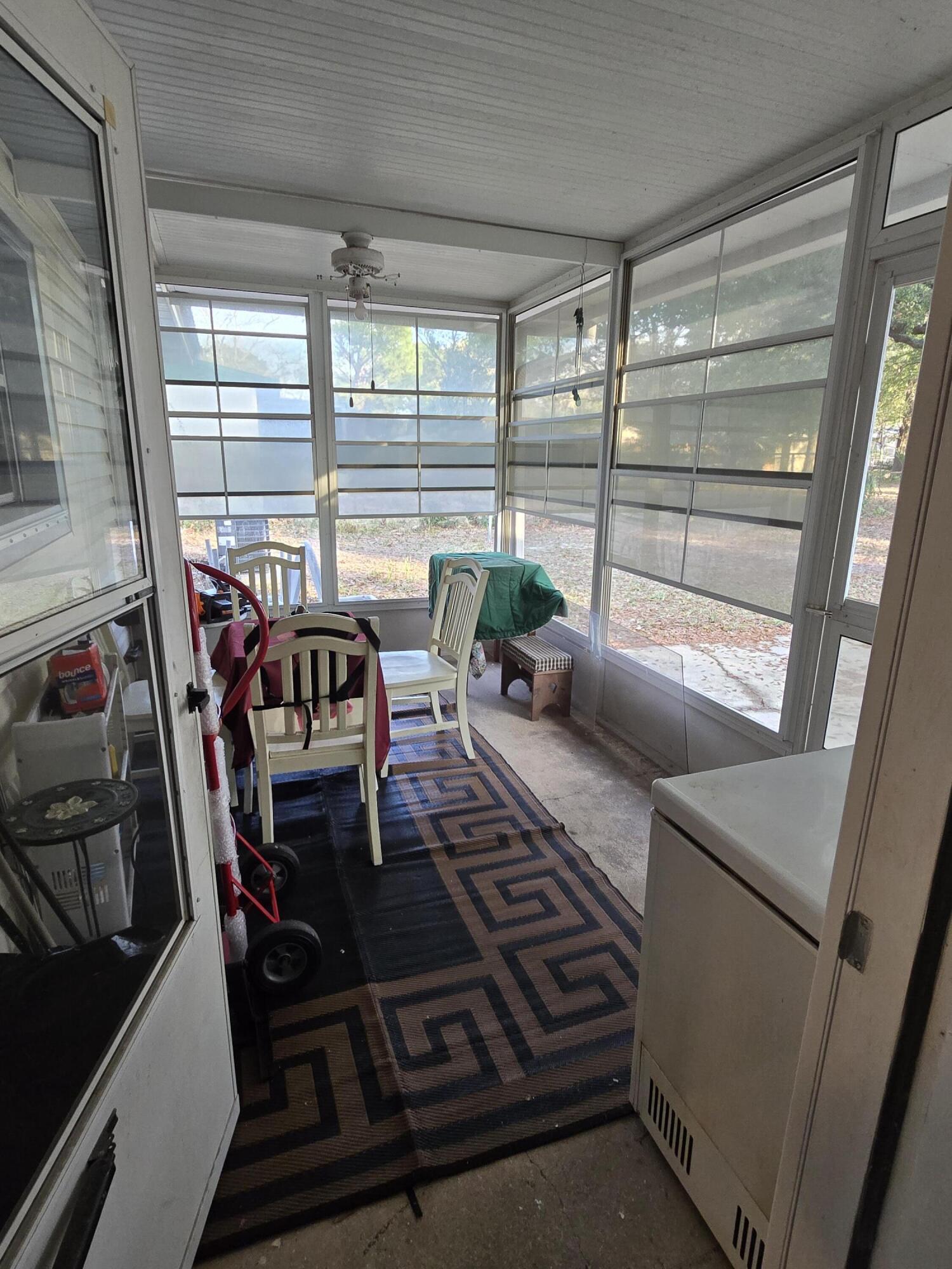 413 Ed Street Fort Walton Beach, FL 32547 - Photo 35 of 36 a living room with furniture a large window