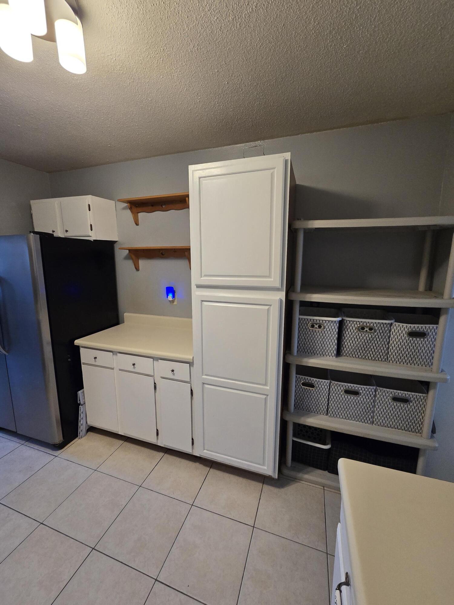 413 Ed Street Fort Walton Beach, FL 32547 - Photo 8 of 36 a utility room with dryer and washer