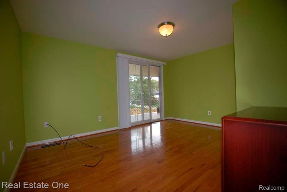 33926 Old Timber Road Farmington, MI 48331 - Photo 13 of 24 Bedroom No.2 also have access to balcony.