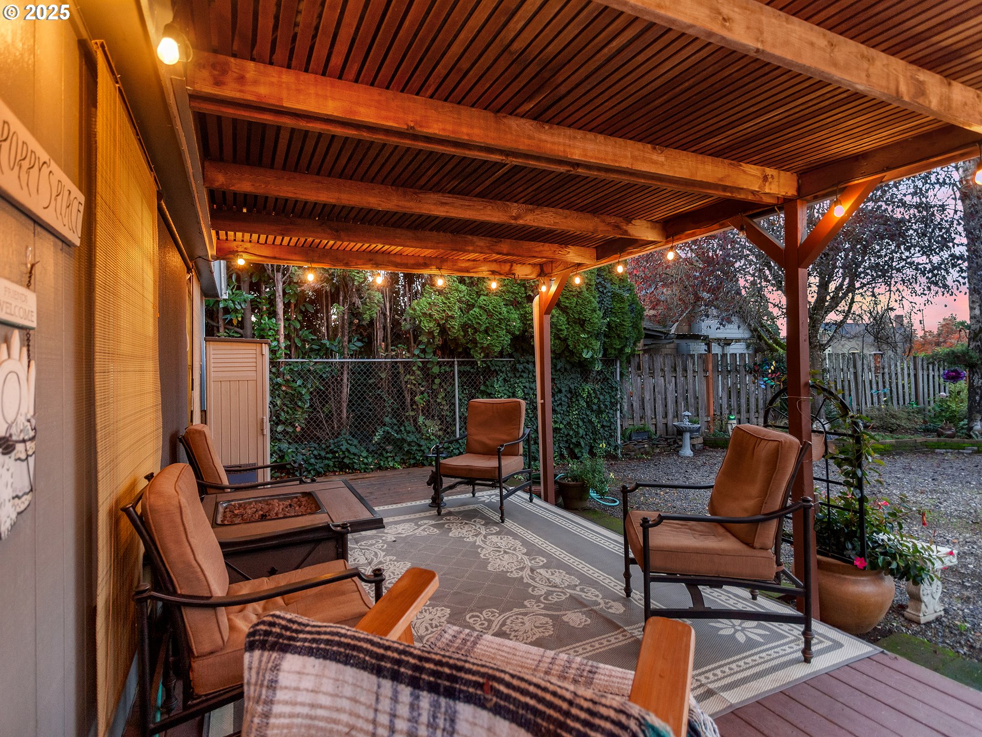 299 Southwest 3rd Avenue Canby, OR 97013 - Photo 2 of 32 a backyard of a house with outdoor seating
