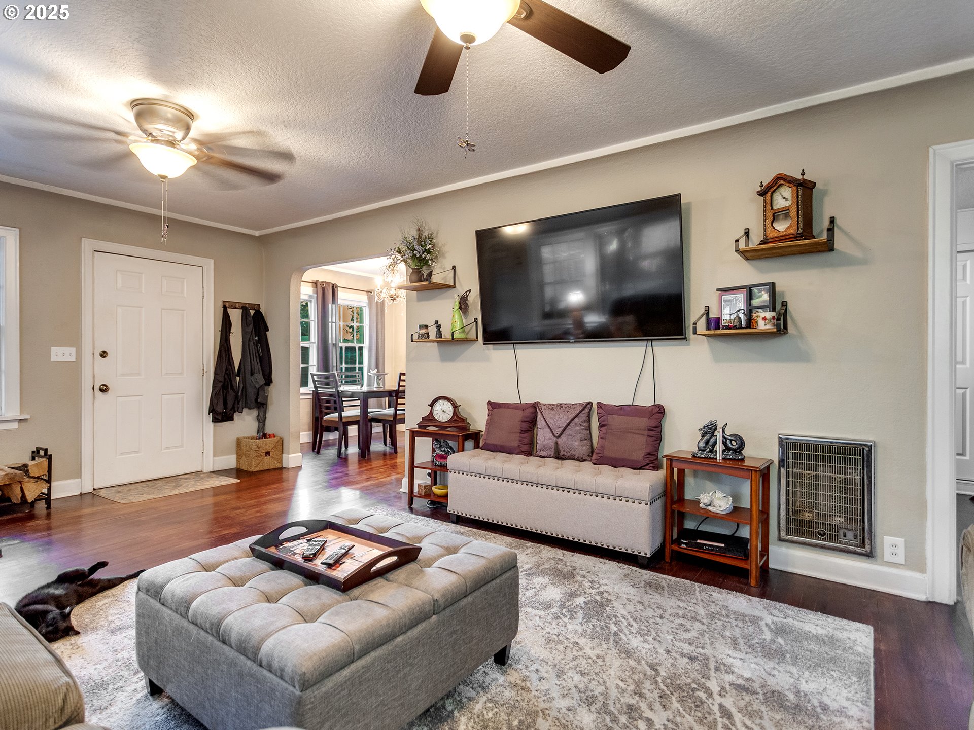 299 Southwest 3rd Avenue Canby, OR 97013 - Photo 5 of 32 a living room with furniture and a flat screen tv