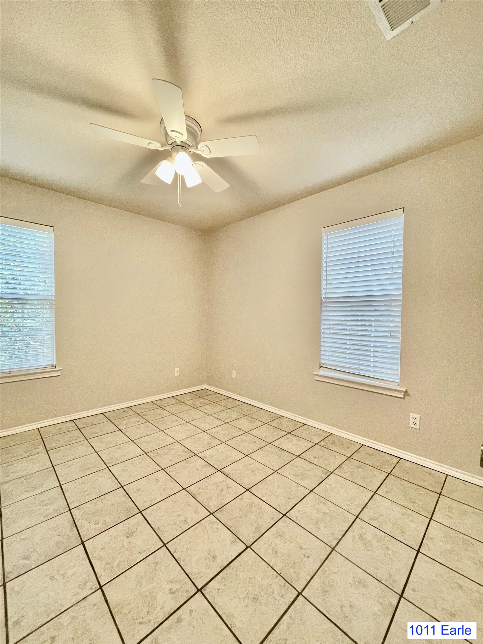 1007-1015 Earle Street San Marcos, TX 78666 - Photo 18 of 25 a view of an empty room and window