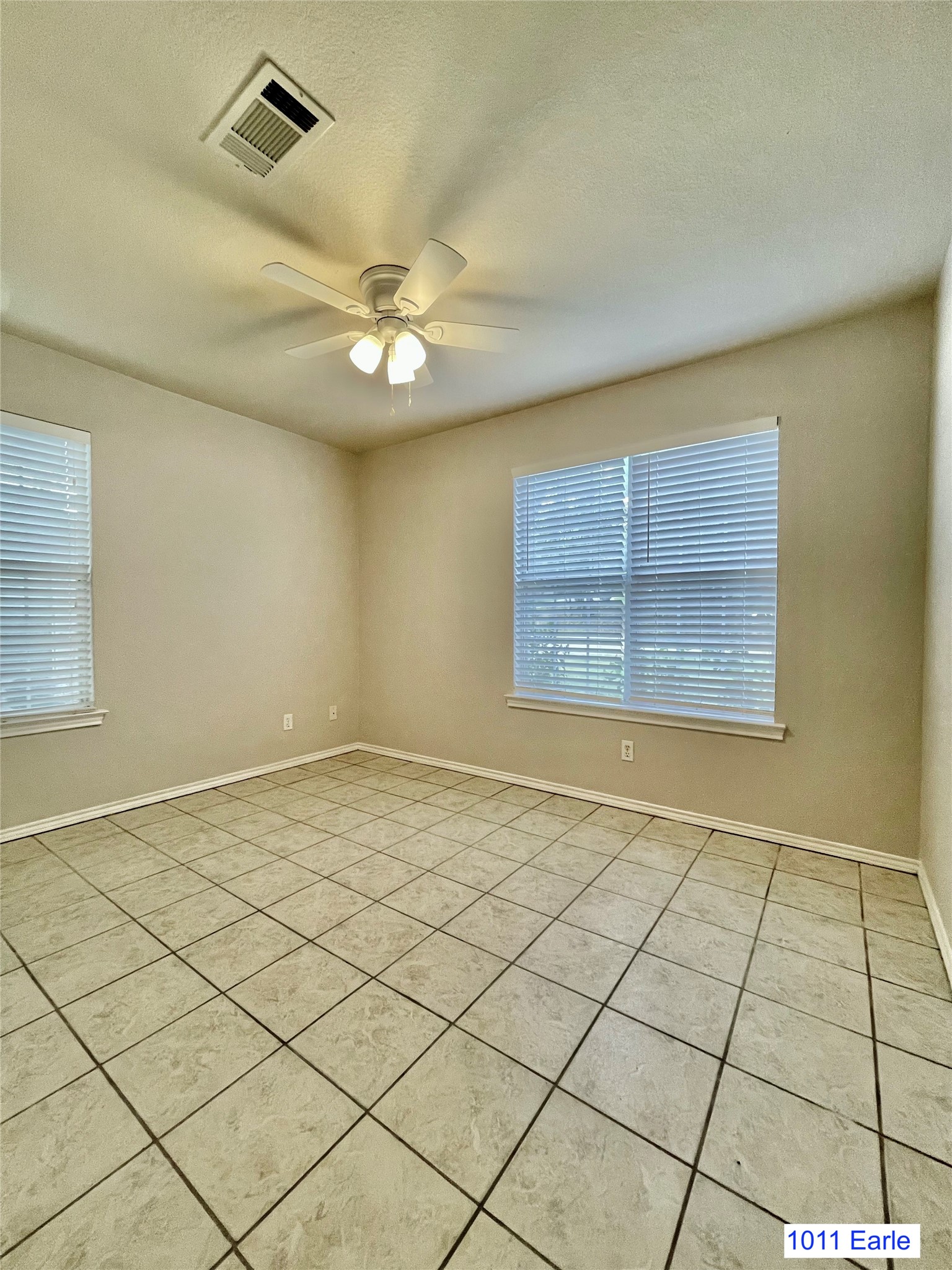 1007-1015 Earle Street San Marcos, TX 78666 - Photo 20 of 25 an empty room with windows