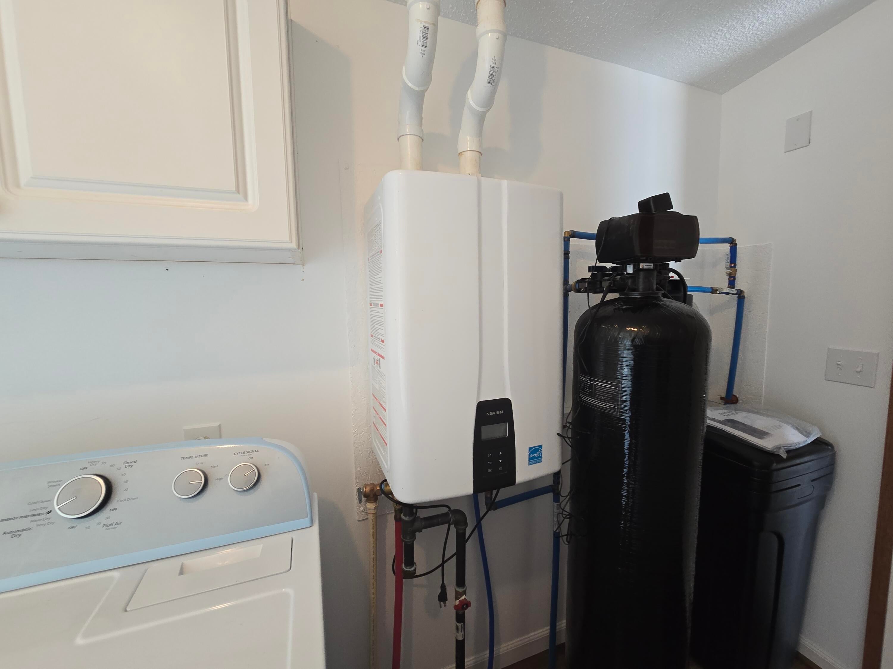 11990 Lake 15 Road Atlanta, MI 49709 - Photo 20 of 33 New On Demand Water Heater