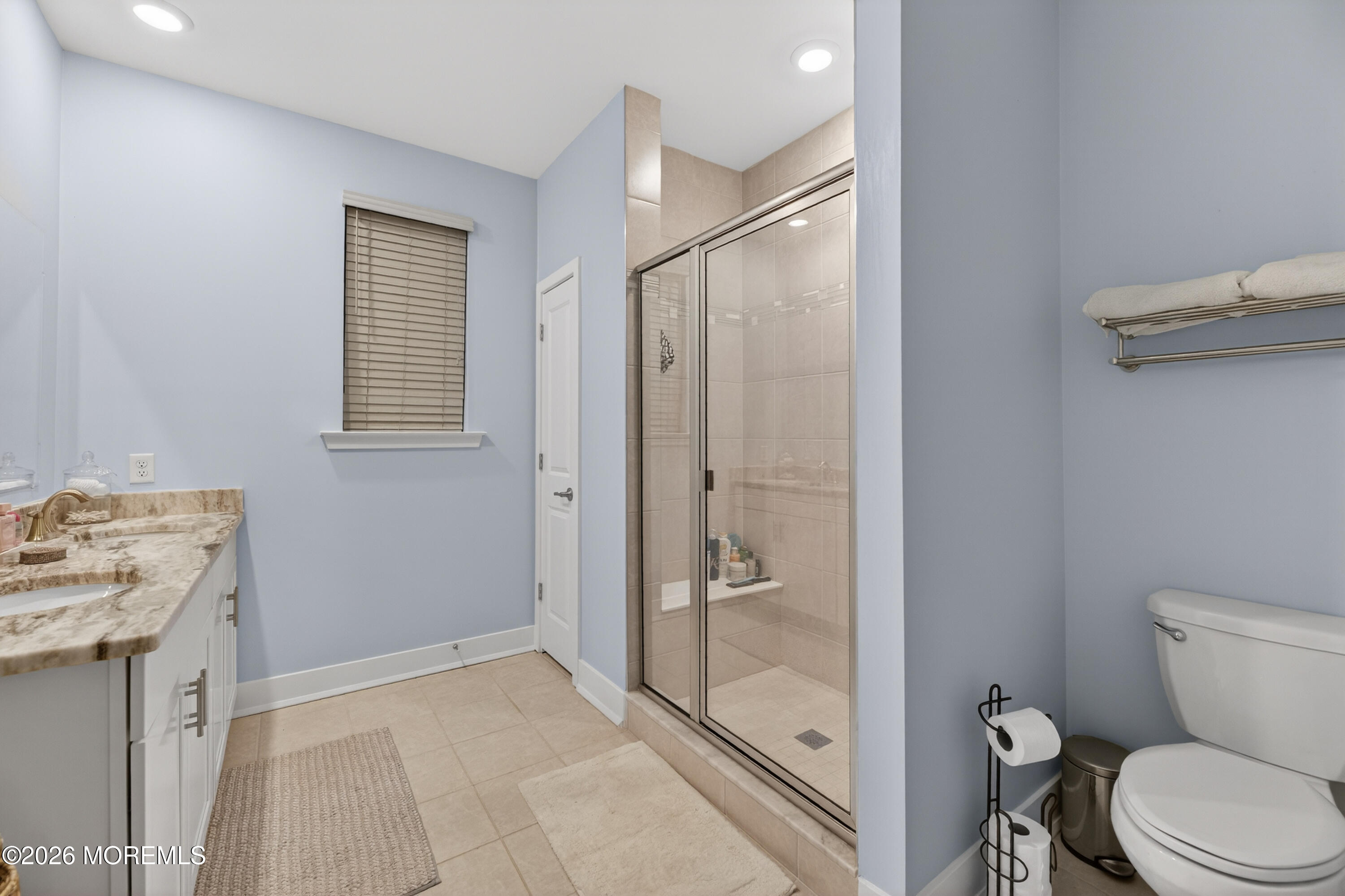 35 Saratoga Road New Egypt, NJ 08533 - Photo 22 of 43 a bathroom with a granite countertop toilet a sink and a shower