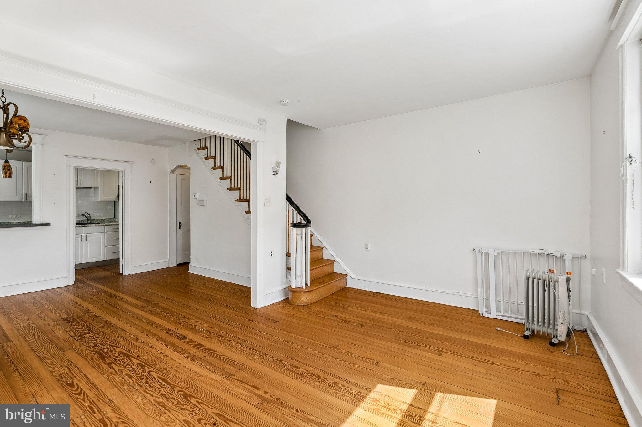 527 South 7th Street, Unit 1 Philadelphia, PA 19147 - Photo 15 of 33 Spacious, sunlit living area awaits.