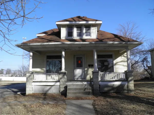 a view of a house with a patio