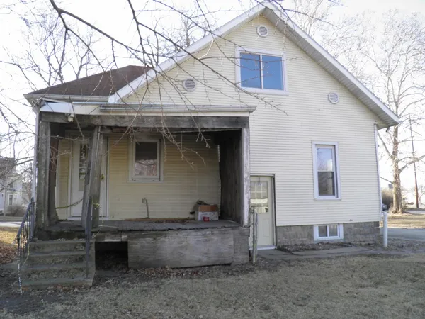 a front view of a house with balcony