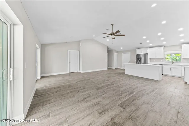 a view of kitchen with wooden floor