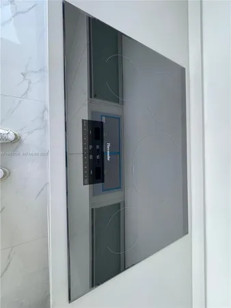 a storage and utility room with washer and dryer