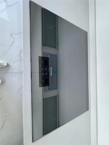 a storage and utility room with washer and dryer