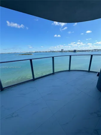 a view of a terrace with a water view