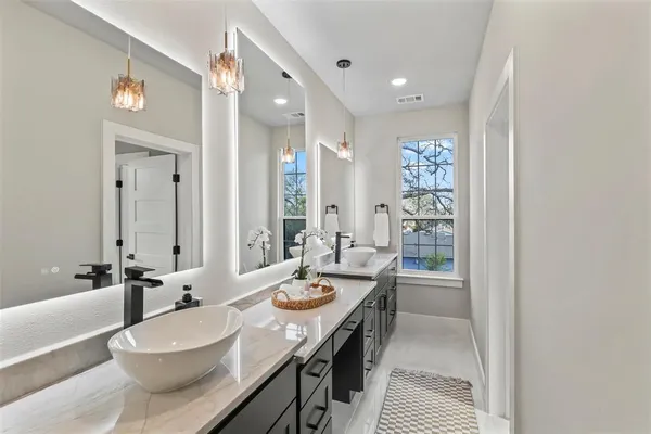a bathroom with a toilet sink and bathtub