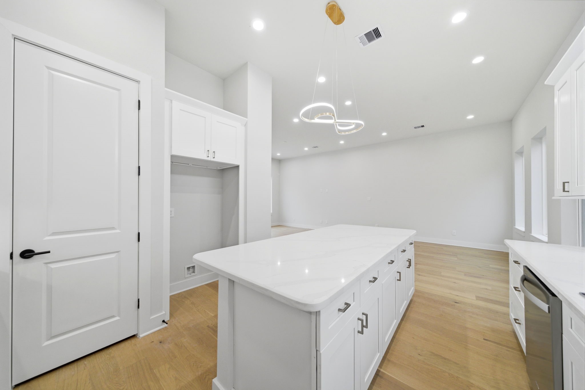 330 Janisch Road, Unit A Houston, TX 77018 - Photo 19 of 40 a utility room with a sink a refrigerator and window