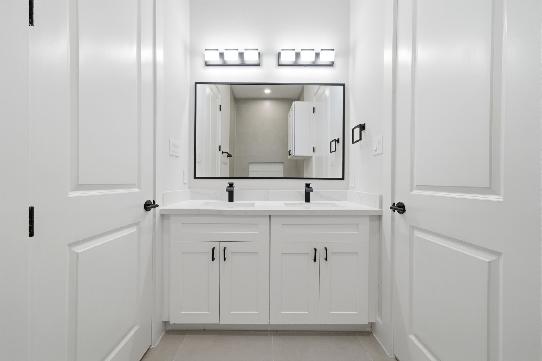 330 Janisch Road, Unit A Houston, TX 77018 - Photo 22 of 40 a bathroom with a sink and a mirror