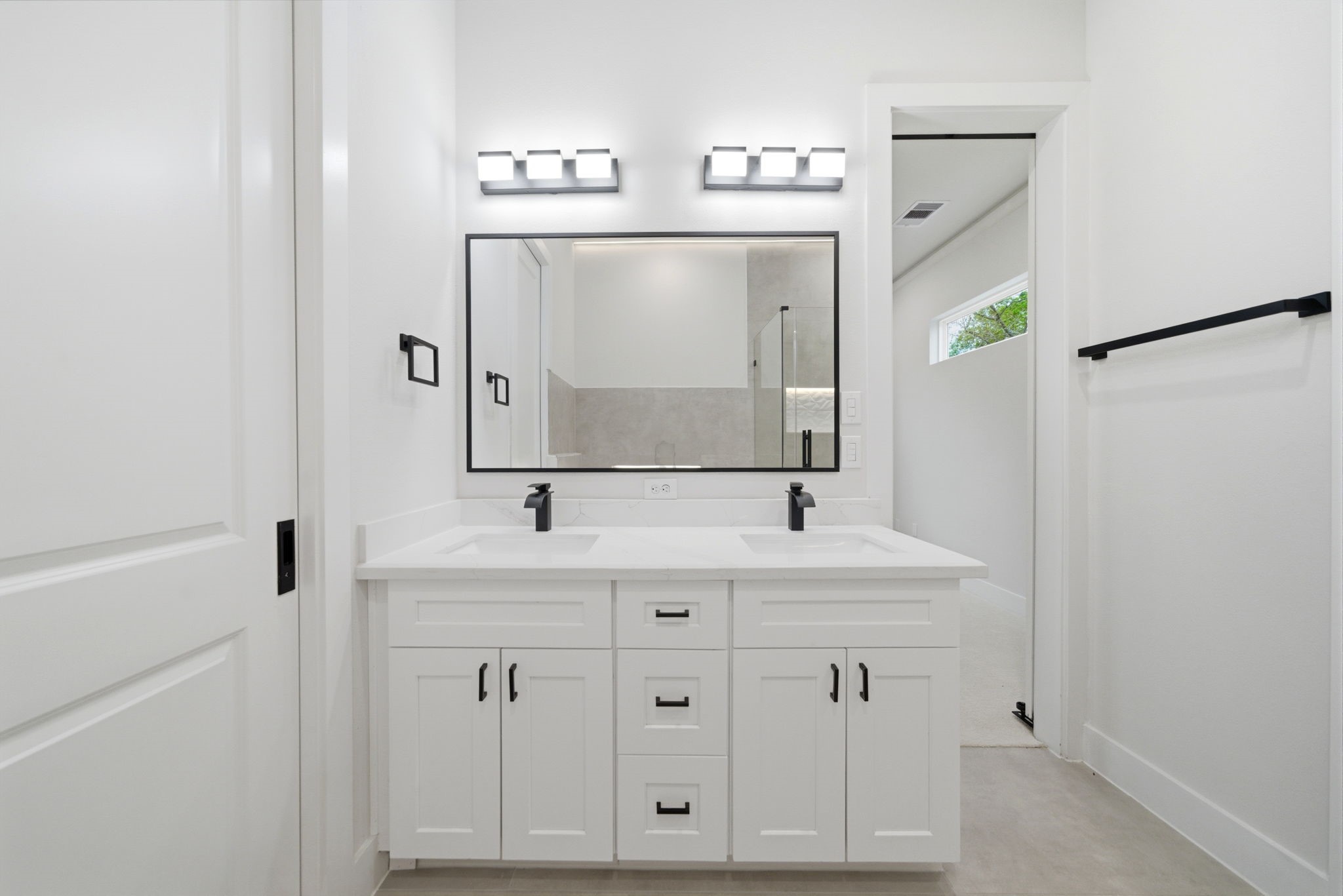 330 Janisch Road, Unit A Houston, TX 77018 - Photo 29 of 40 a bathroom with a sink a mirror and a vanity