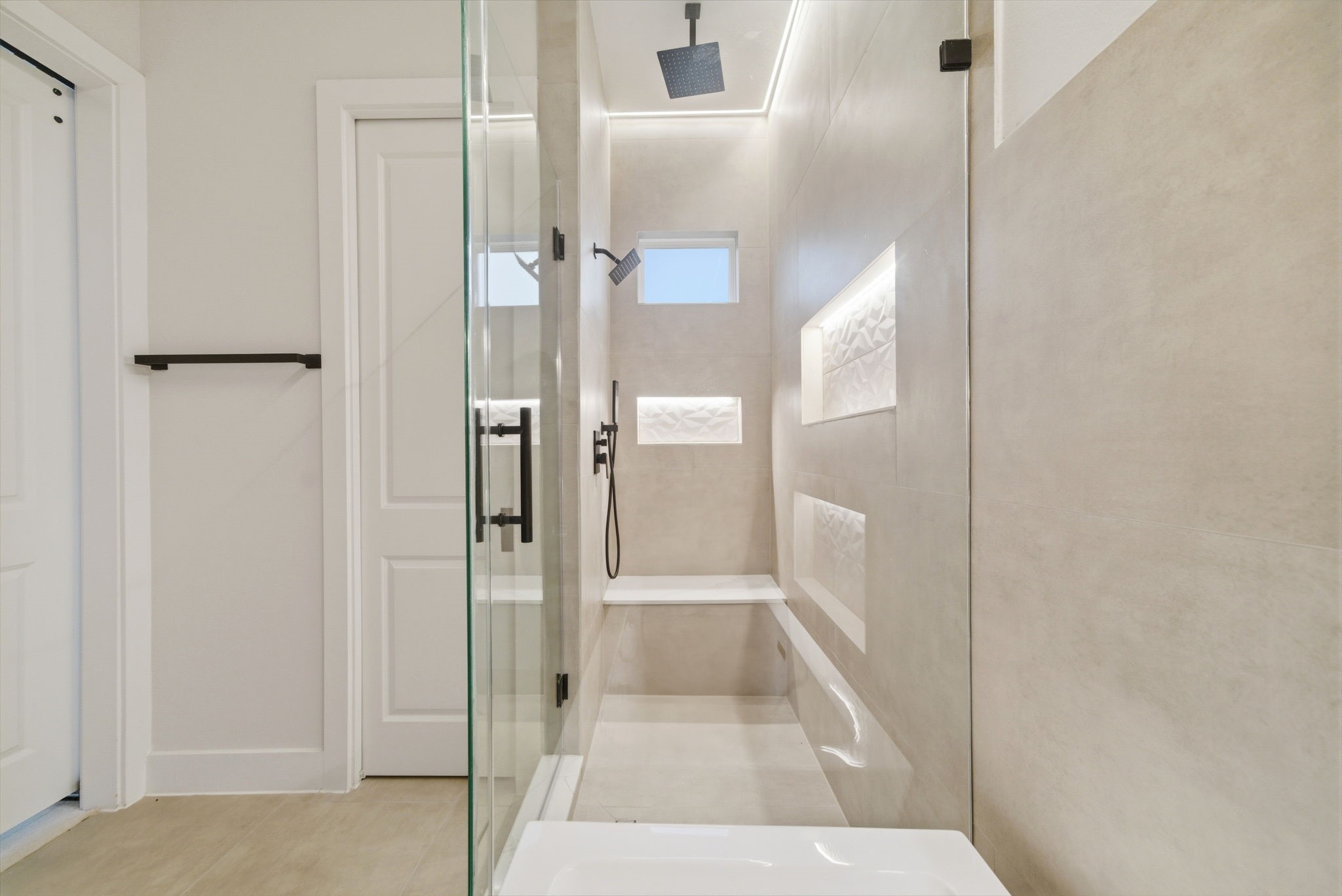 330 Janisch Road, Unit A Houston, TX 77018 - Photo 32 of 40 a bathroom with a tub and shower