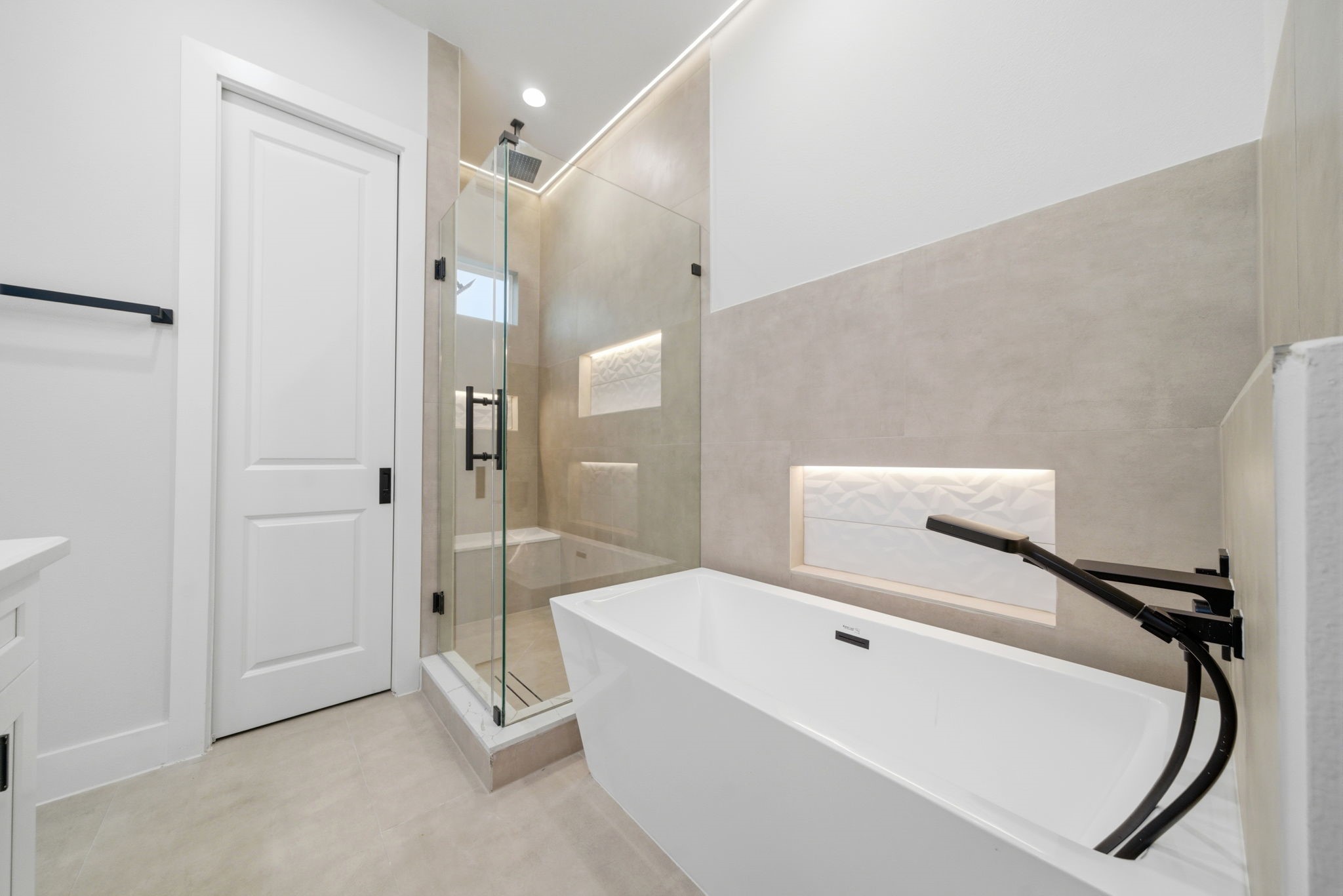 330 Janisch Road, Unit A Houston, TX 77018 - Photo 34 of 40 a bathroom with a bathtub and shower