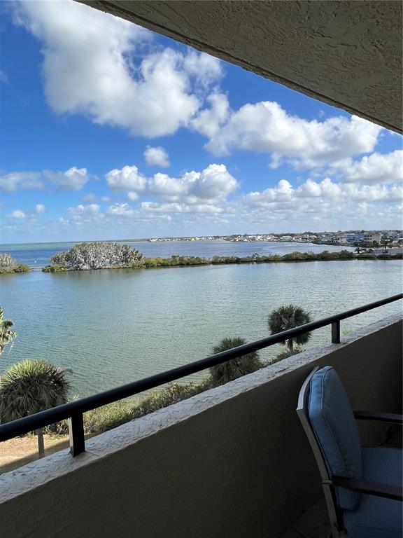 5915 Sea Ranch Drive, Unit 512 Hudson, FL 34667 - Photo 31 of 55 a view of a lake with outdoor space