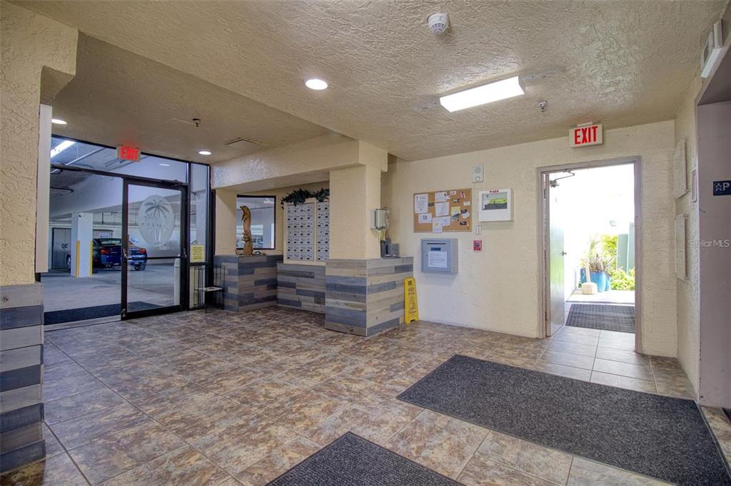 5915 Sea Ranch Drive, Unit 512 Hudson, FL 34667 - Photo 42 of 55 a view of a livingroom with furniture and an entryway