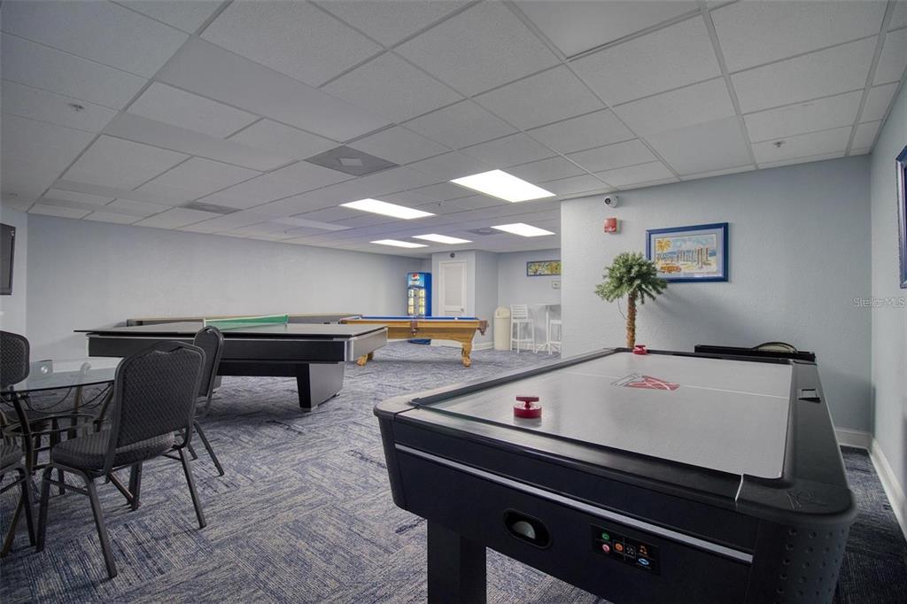 5915 Sea Ranch Drive, Unit 512 Hudson, FL 34667 - Photo 45 of 55 a room with furniture pool table and flat screen tv