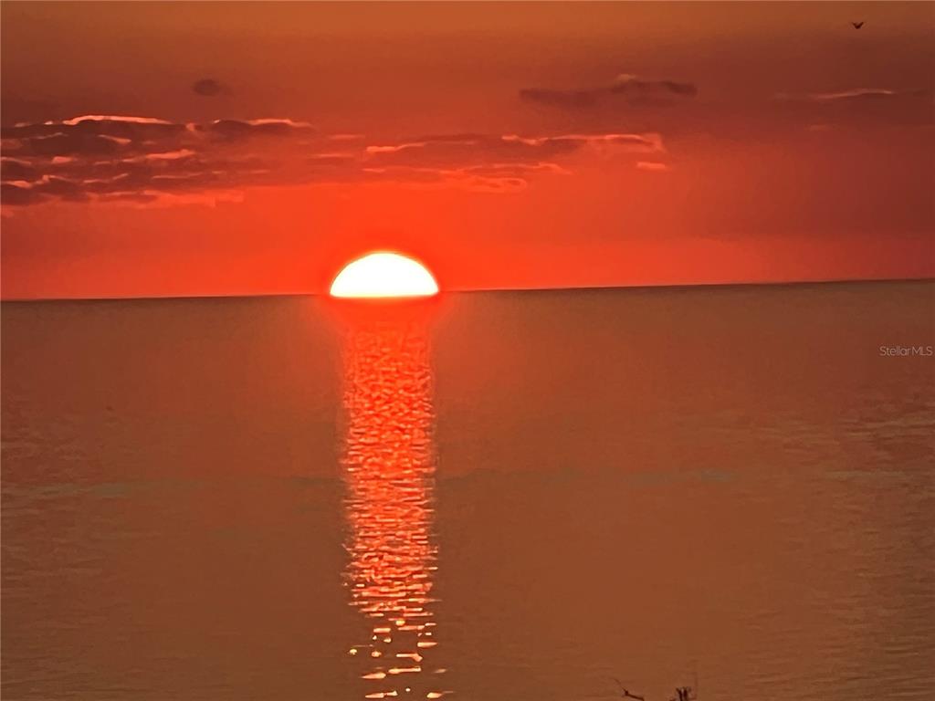 5915 Sea Ranch Drive, Unit 512 Hudson, FL 34667 - Photo 51 of 55 a view of a ocean with a beach