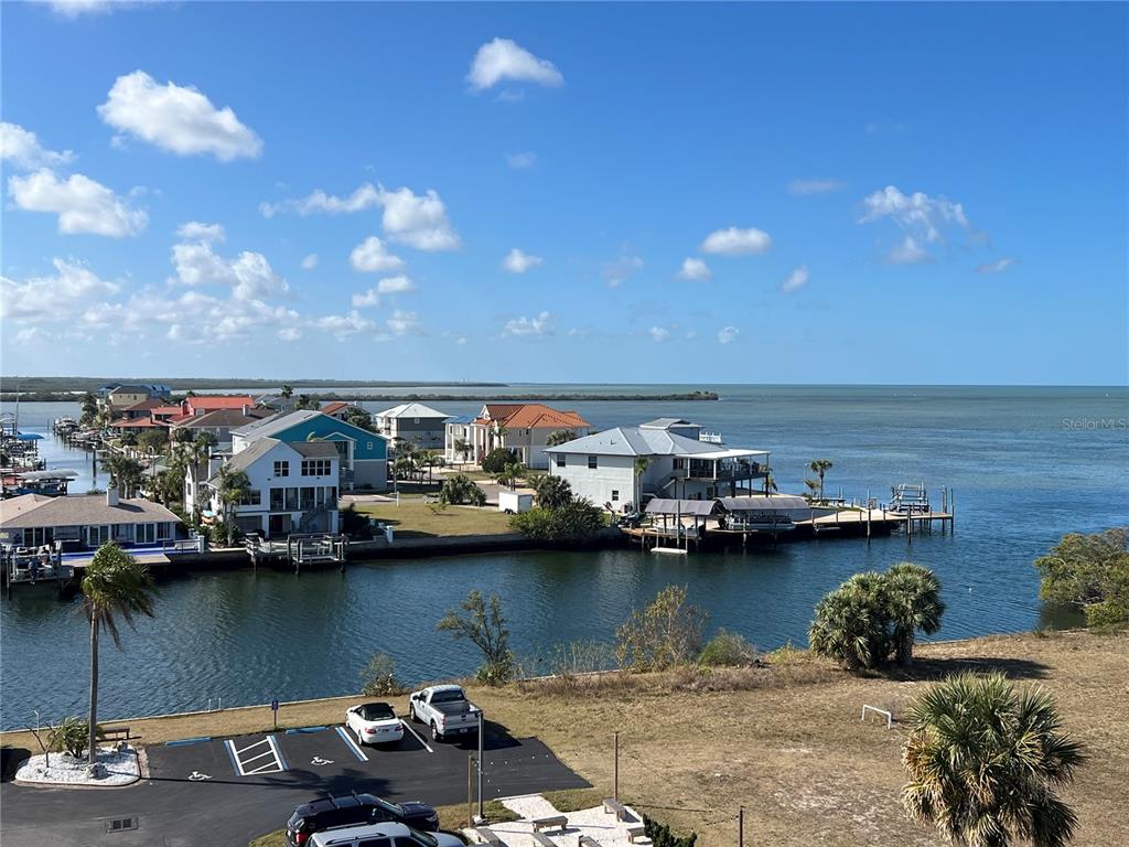 5915 Sea Ranch Drive, Unit 512 Hudson, FL 34667 - Photo 55 of 55 a view of a lake with houses