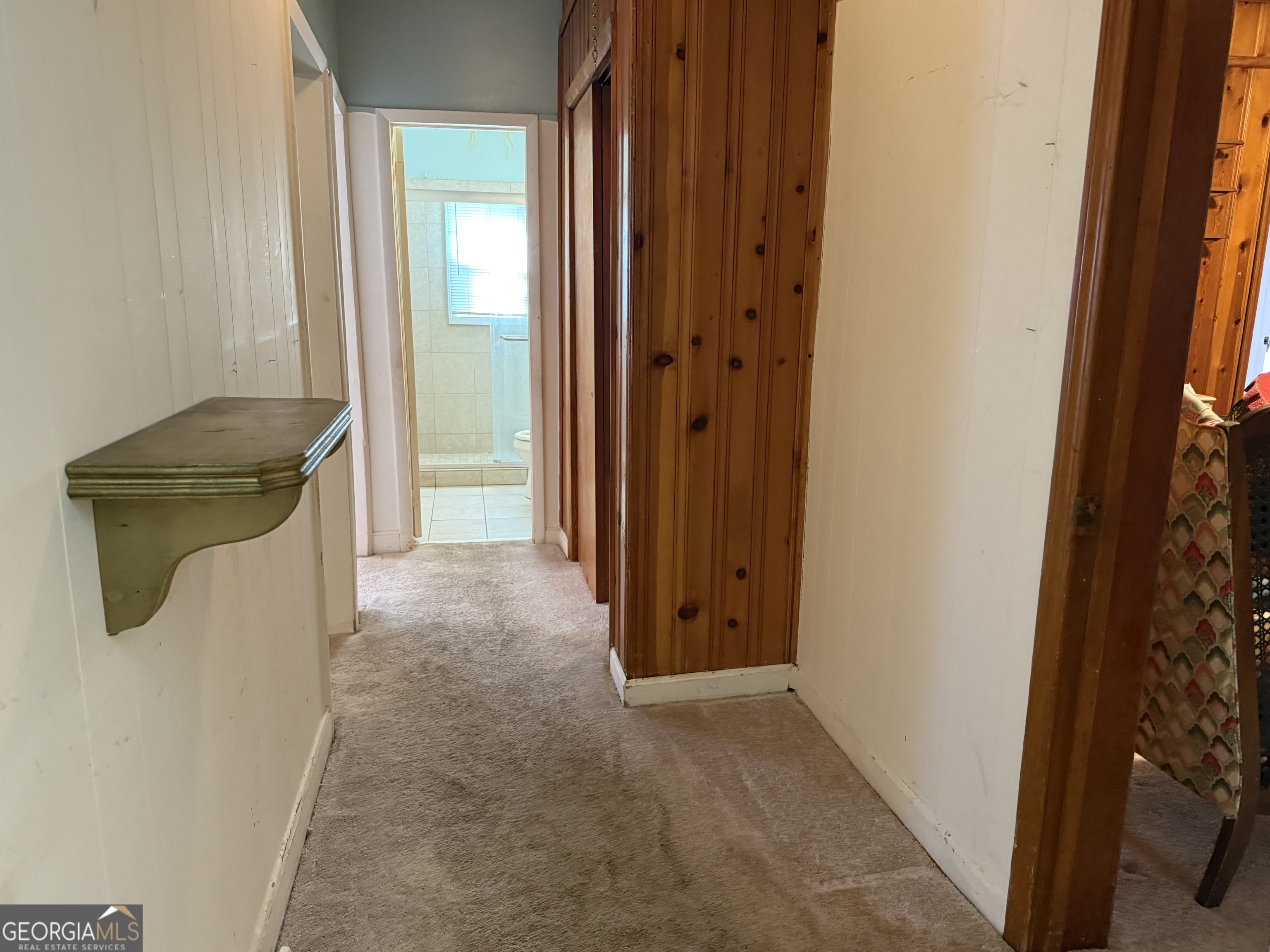 641 South Masonic Street Millen, GA 30442 - Photo 15 of 20 a view of a bathroom from a hallway